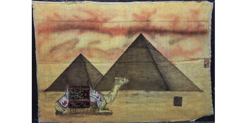 Great Pyramids of Giza, in the foreground a traditionally decorated camel